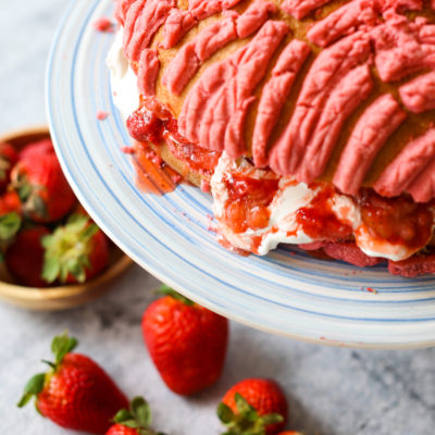Concha Cake with Whipped Cream and Macerated Strawberries