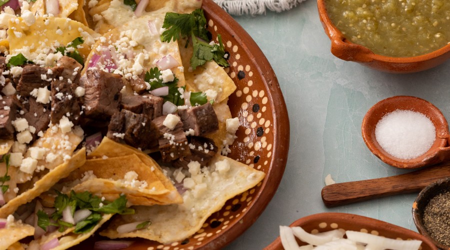 Chilaquiles Verdes with carne asada