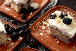 coconut blackberry tres leches cake made with coconut milk