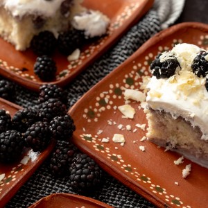coconut blackberry tres leches cake made with coconut milk