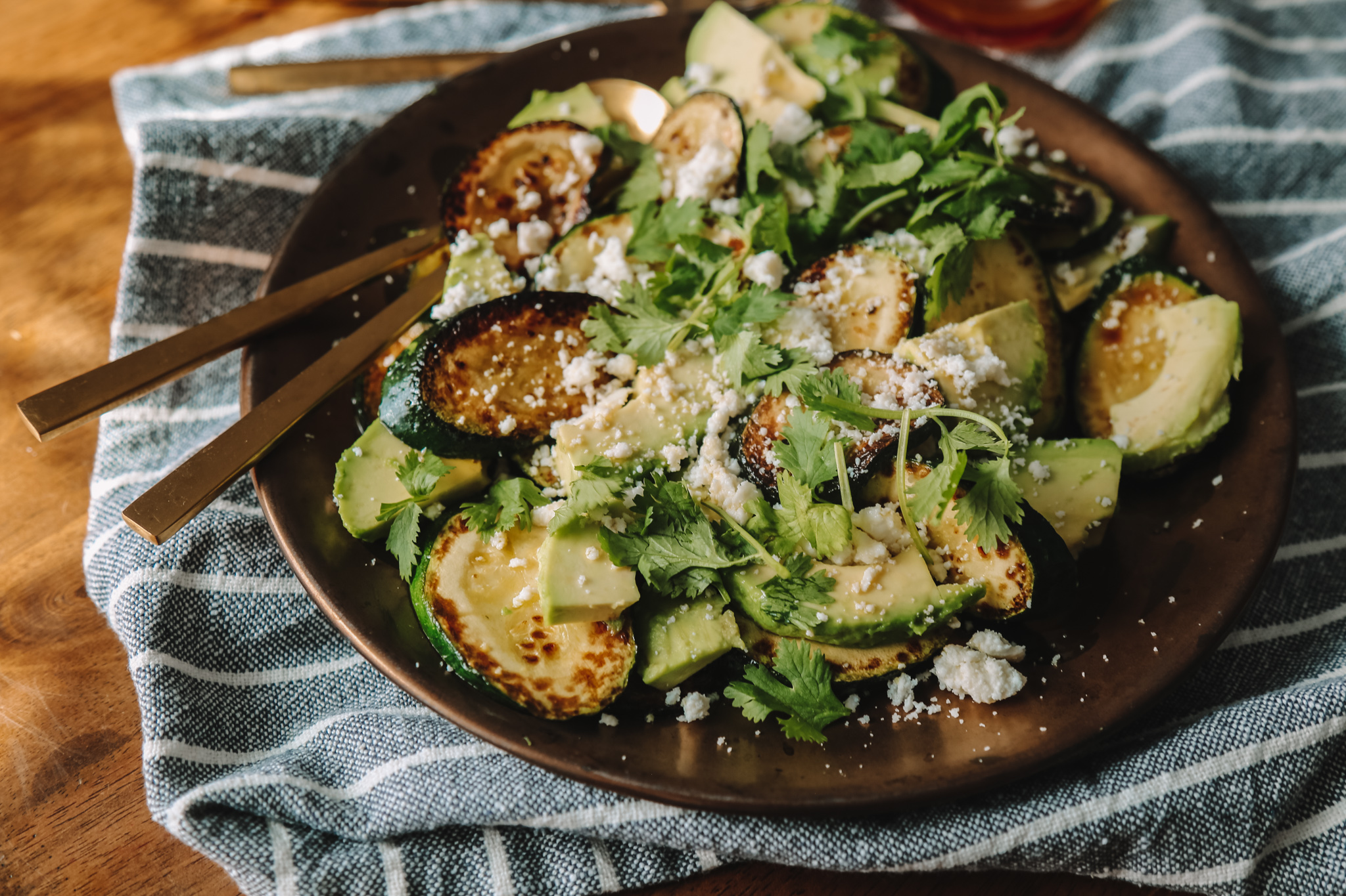 salad of grilled zucchini, avocado, and salty, crumbled queso fresco 